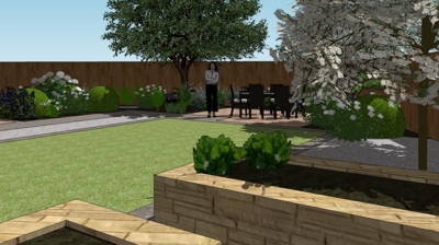 A backyard design with a wooden fence, trees, flowerbeds, and a patio area. Photo